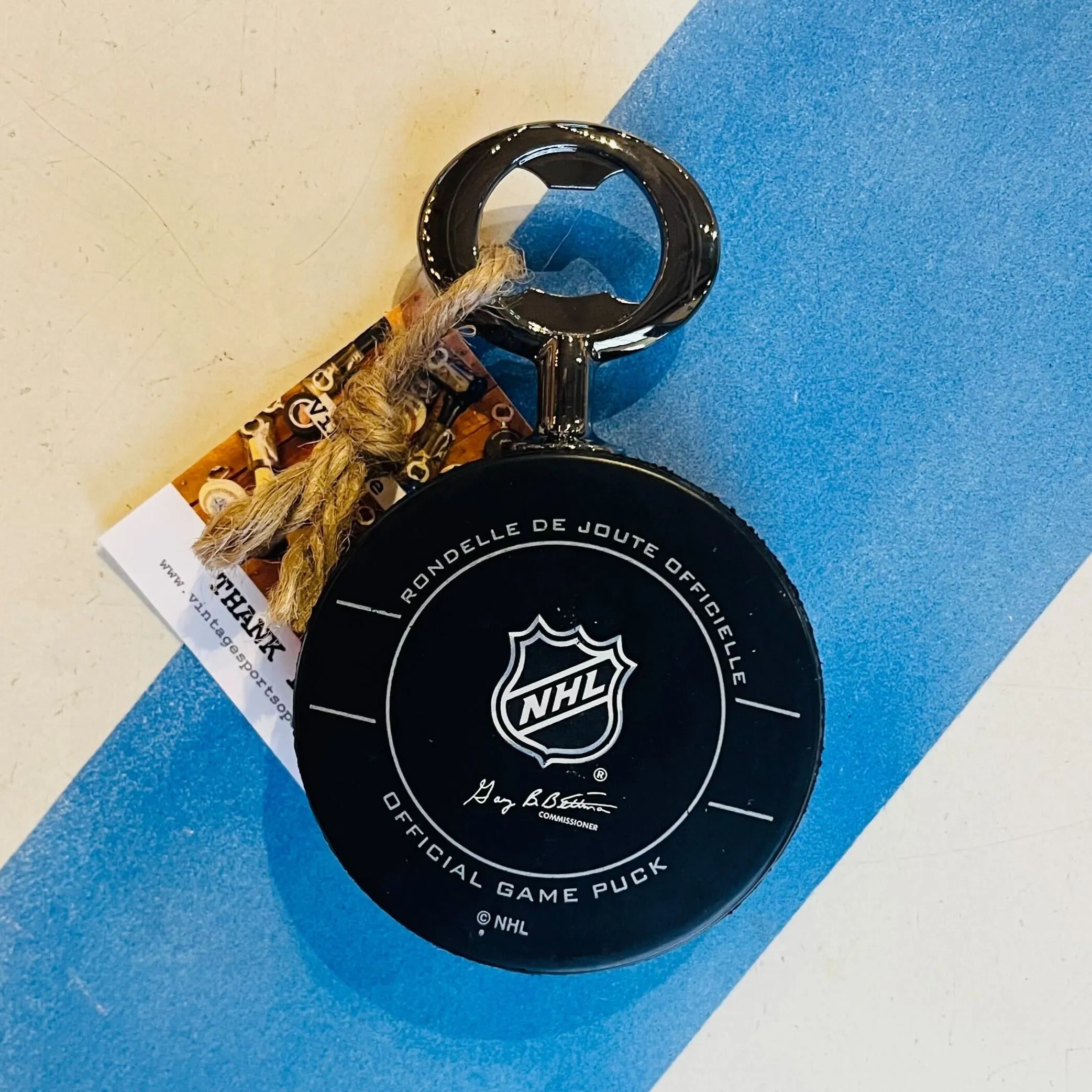 Colorado Avalanche Early 2000s Era Authentic NHL Official Game Hockey Puck Bottle Opener